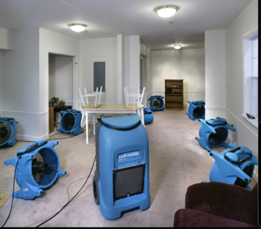 Air movers and dehumidifier setup for Water Damage Restoration in Highland Park